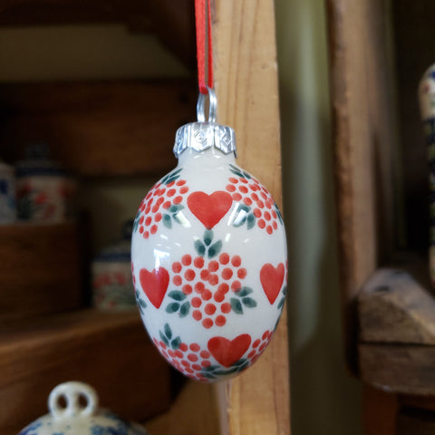 Egg hanging red hearts