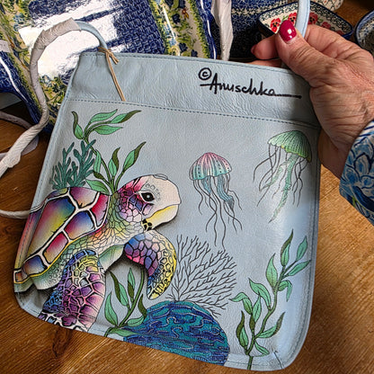 Anuschka ~ slim Crossbody Blue / Turtle front zipper