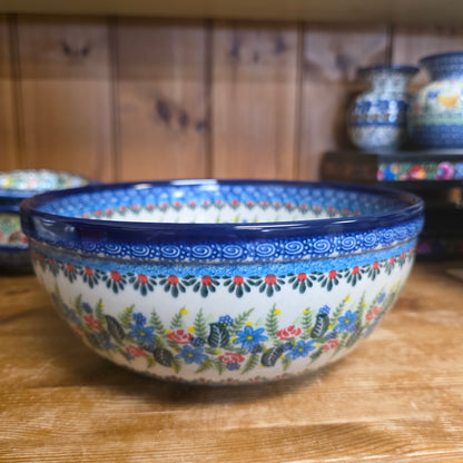 Bowl 9" Serving ~ #1 423 blue  (3 3/4 "deep) this bowl has a raised edge