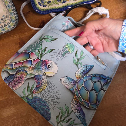 Anuschka ~ slim Crossbody Blue / Turtle front zipper